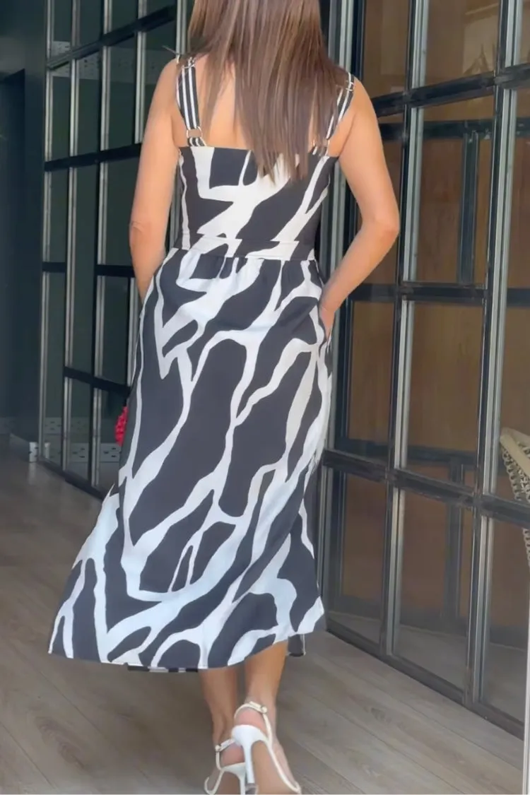 Fashionable hem slit suspender midi dress